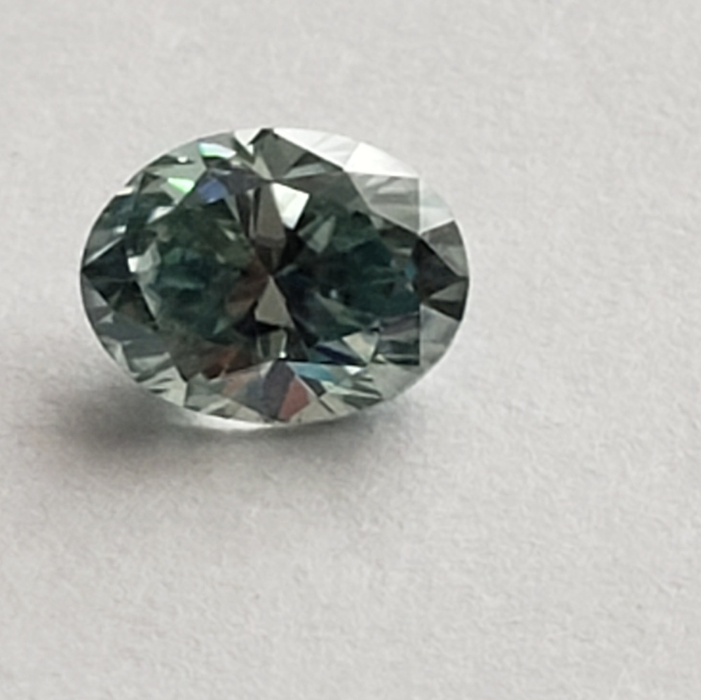 Light blue oval moissanite 1ctw